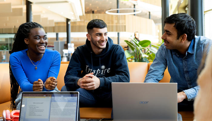 Students using social and study spaces in the student centre