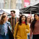 Group of students walking through campus