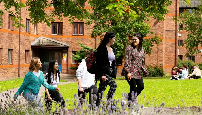 students walking outside Ribble Hall