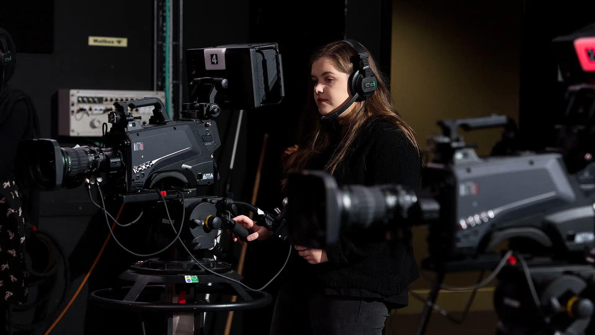 film production student using specialist equipment