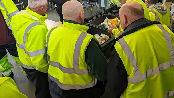 Group photo of Toolbox Talk learners in high-visibility vests