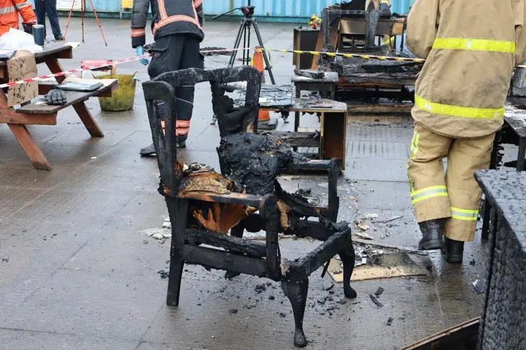 A burnt chair at a fire investigation scene