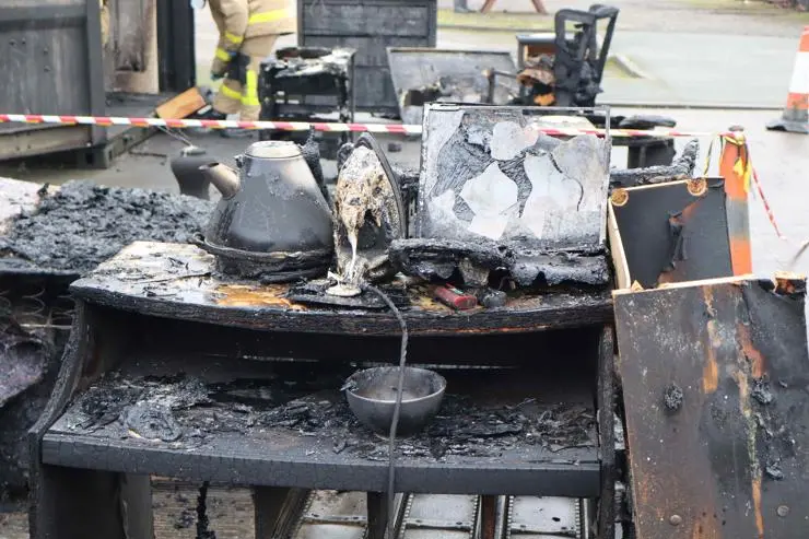 Burnt kitchen equipment at a fire investigation scene