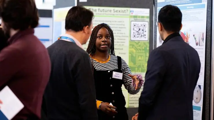 Victoria Babajide speaking to event attendees