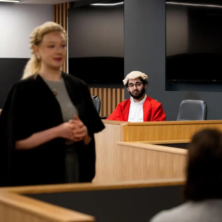 Law student Adeel takes on the role of judge.