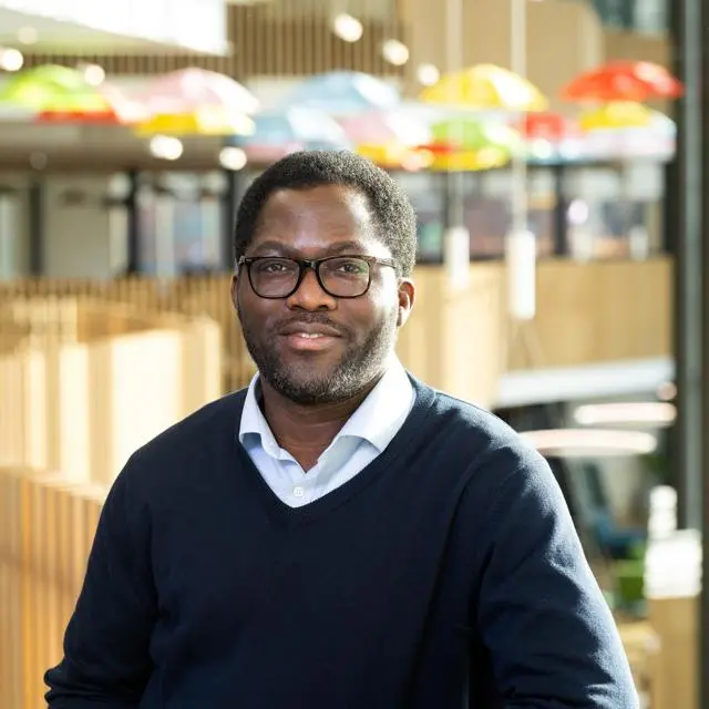 Headshot of Dr Ibukunolu David Babarinde