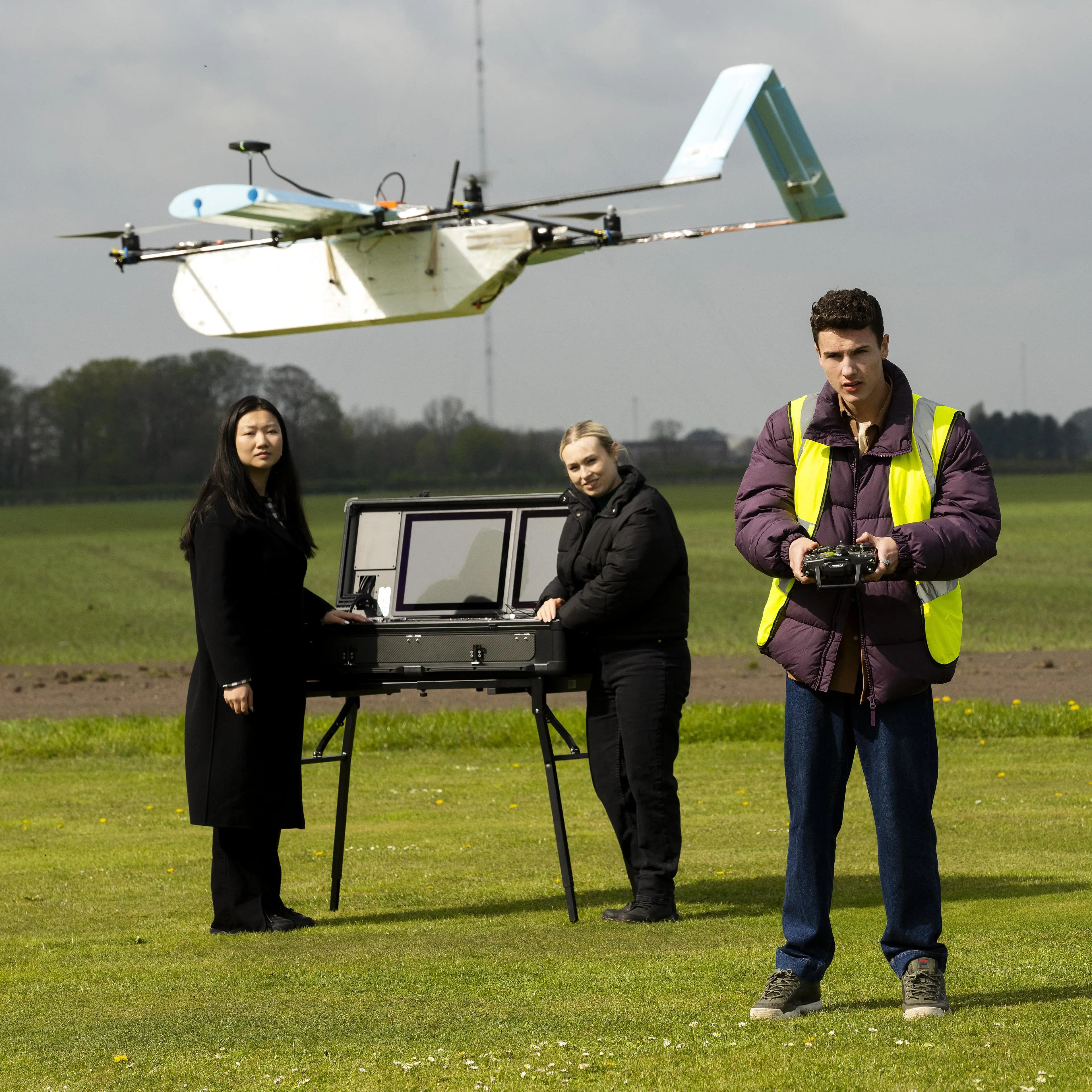 students-with-drone-plane-aerospace-eng-square