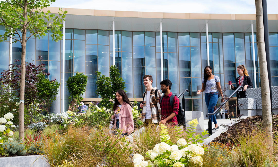 Students walking in front of the Student Centre