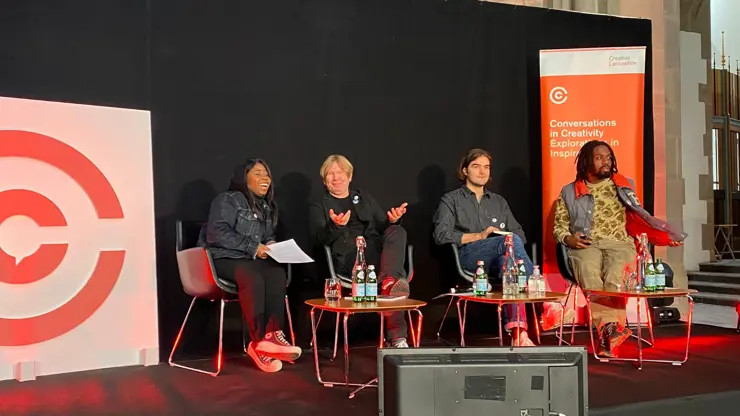  Tiwi Ndoro, BA (Hons) Fashion Promotion graduate on stage with her colleagues (Tiwi is on the far left).