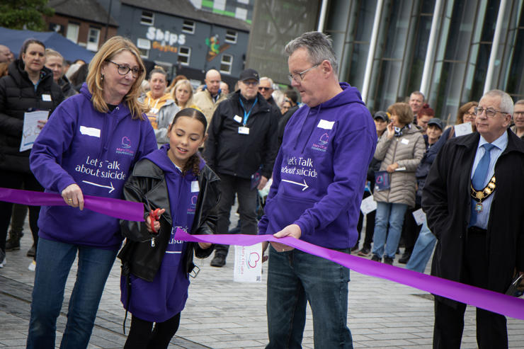 Sharon and Paul O'Gara officially start the walk with their granddaughter