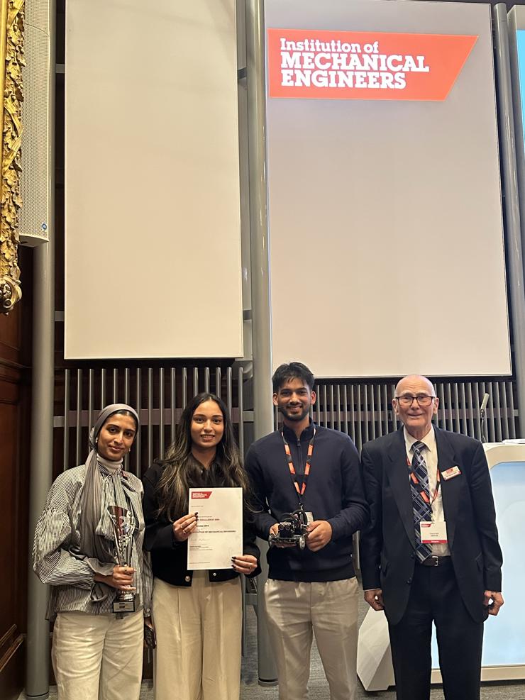 (L-R) Engineering students Rabia Muzzafar-bibi, Mishel Daluwattage and Abbas Hussain with IMechE Challenge Judge and originator of the competition David Ball.