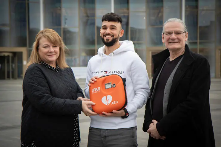 (L-R) Deputy Vice-Chancellor Ruth Connor, disaster medicine student Mohammed Hassan and Peter Hill, Lead Health and Safety Advisor.