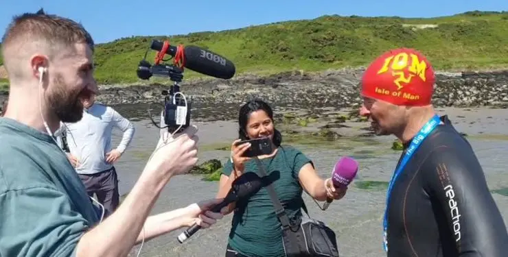 Adam being interviewed when he reached the Isle of Man