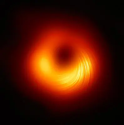a supermassive black hole with orange polarised light around it